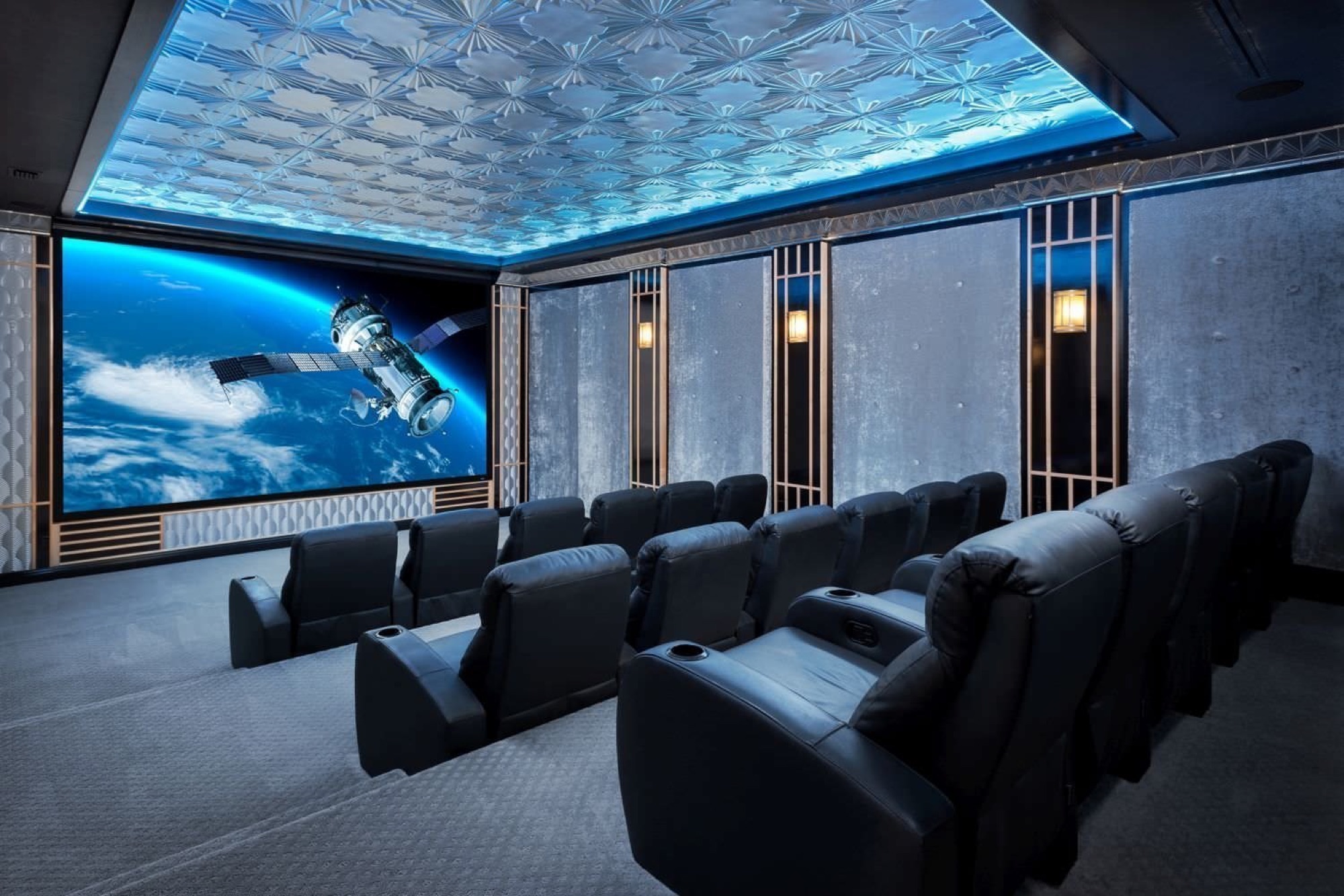 Modern home theater with metallic paneling and gold accents